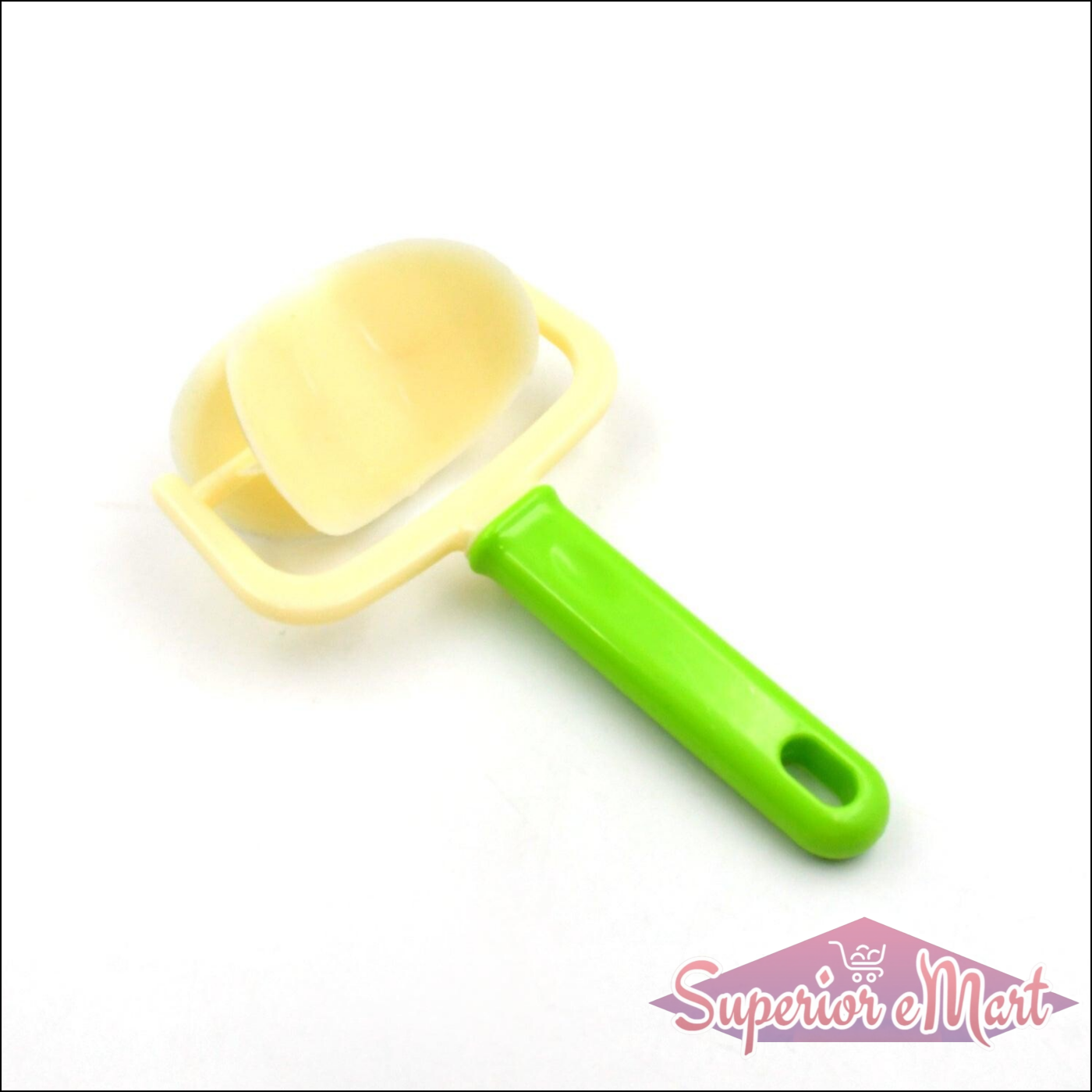 Superior eMart cake ball cutter with a green handle for easy ball shaping in baking