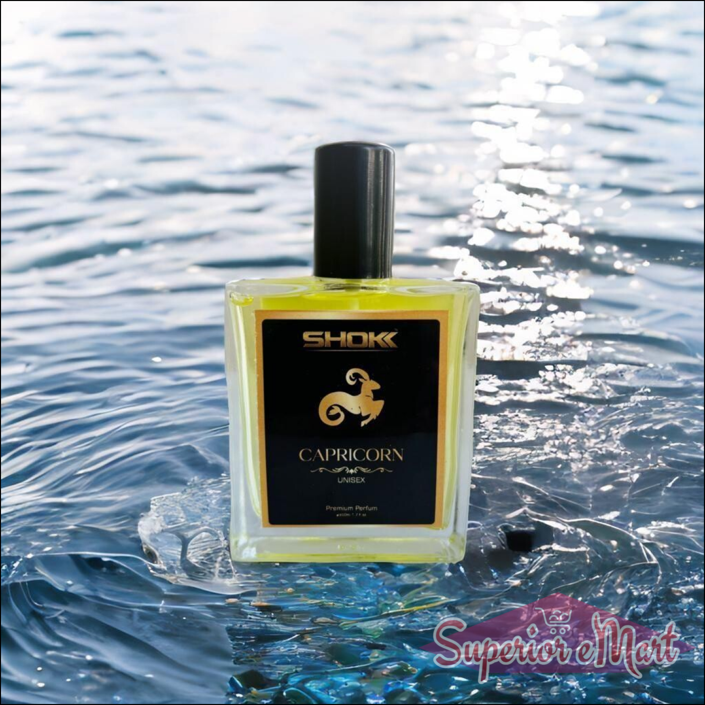 Capricorn Zodiac Unisex Perfume 50ml in a clear bottle against a reflective water background