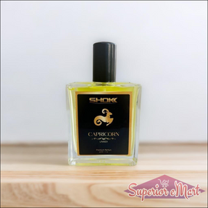 Capricorn Zodiac Unisex Perfume 50ml in a sleek glass bottle with a black label and golden accents