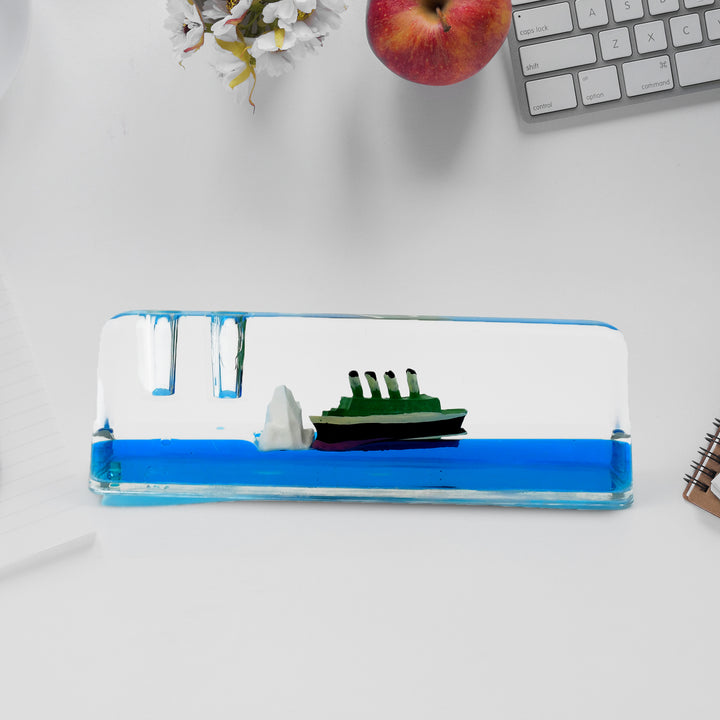 Car dashboard decoration ship made of colorful resin showcasing a green ship and iceberg design