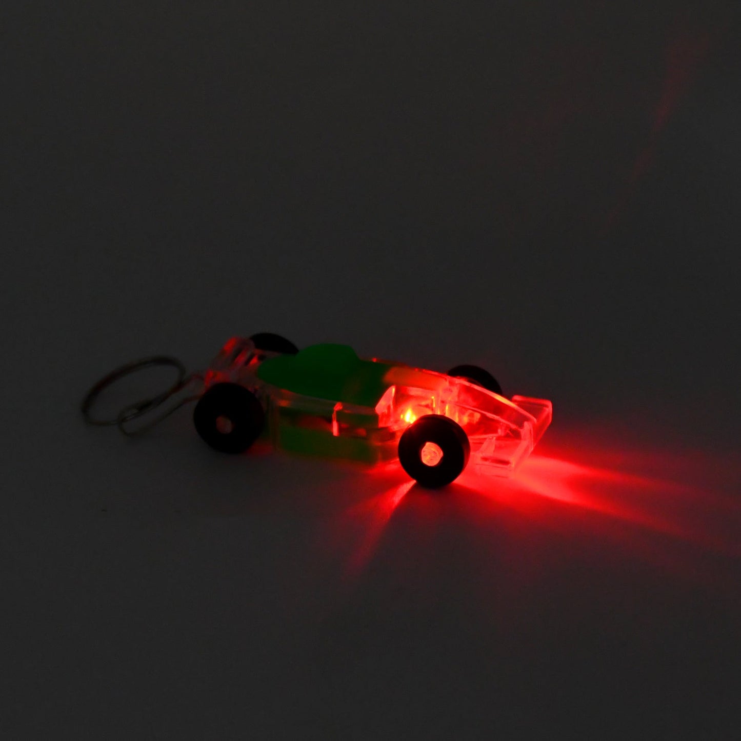 Colorful car shaped keychain with LED lights, perfect for kids and fun accessories