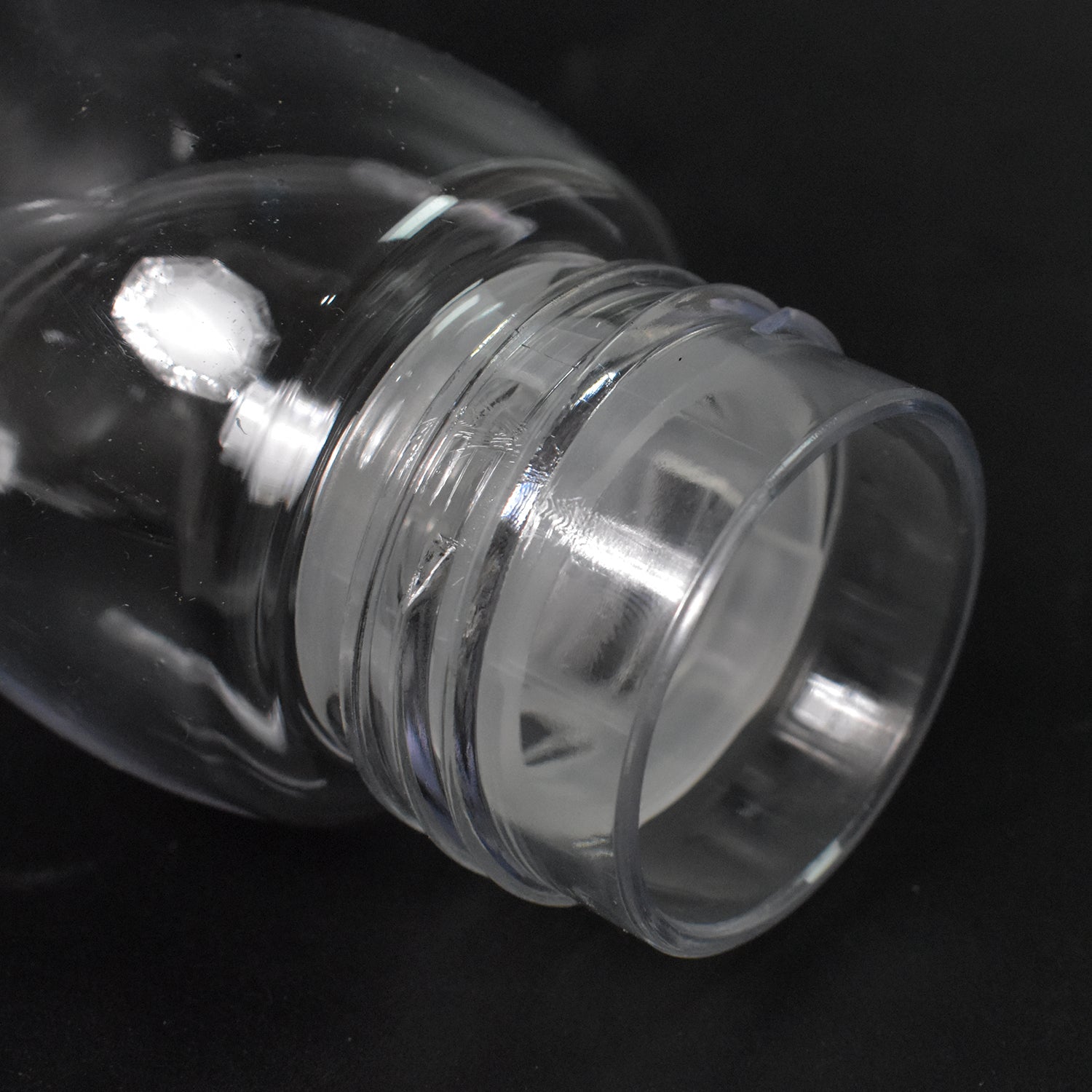 Clear 280 ml water bottle with carry strap and a secure, leak-proof cap for easy portability