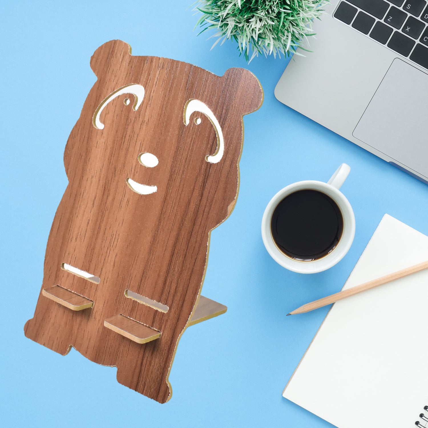 Cartoon wooden mobile stand designed like a bear, perfect for holding phones and tablets on desks