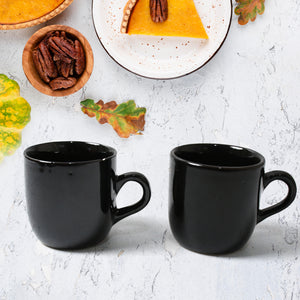 Black ceramic tea cup mug set with elegant design for enjoying hot beverages at home