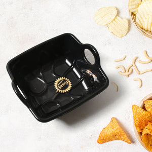 Black ceramic tea cup mug set with a sleek design perfect for serving snacks