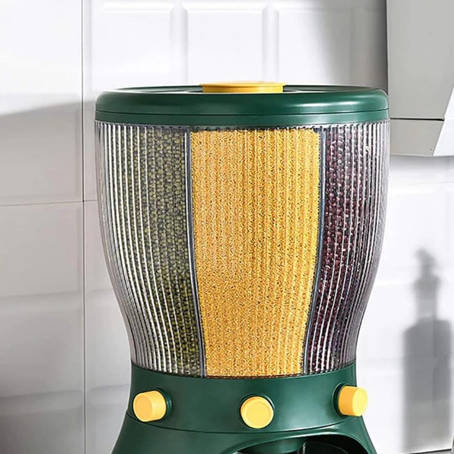 Green 360 degree cereal dispenser with three compartments for storing different cereals