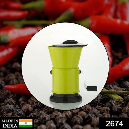 Chilly cutter with sharp blades in bright green color for effortless chopping of spices