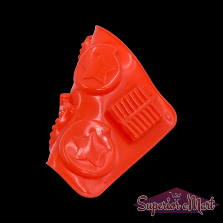 Red silicone chocolate mold tray with star shapes and bars for creative baking projects