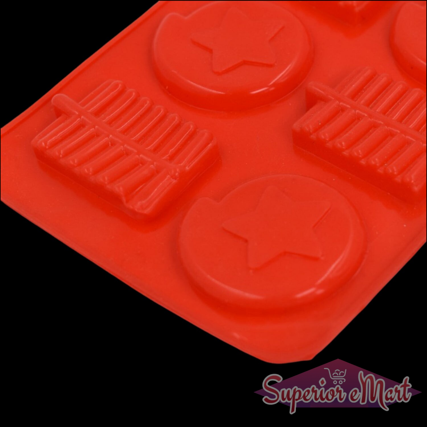 Silicone chocolate mold tray in red featuring star and bar shapes for easy chocolate creation