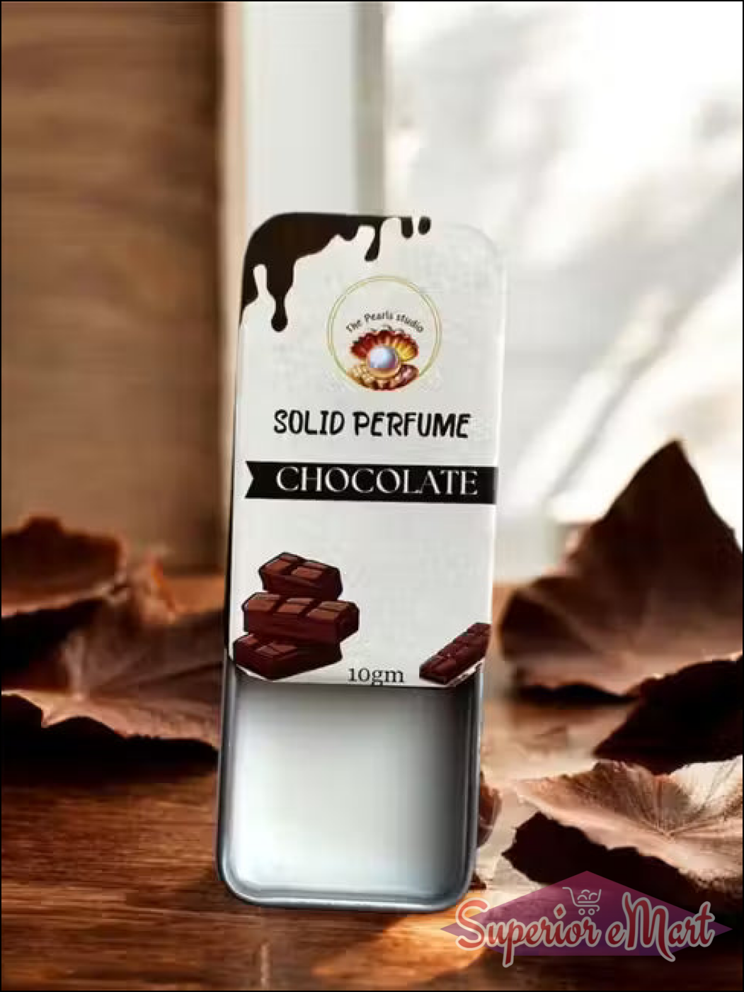 The Pearl Studio 10gm Chocolate Solid Perfume in a sliding silver metal tin with a chocolate-themed white label.
