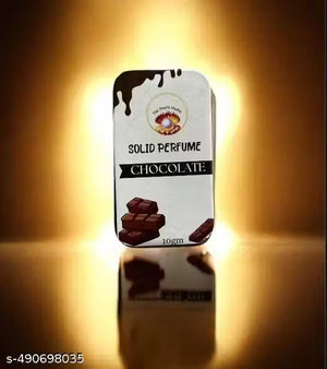 Chocolate Solid Perfume Balm in a sleek tin with a glossy finish for a sweet fragrance experience