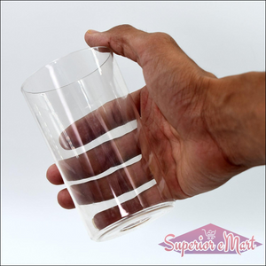 Hand holding a classic glass set of 6 clear drinking glasses suitable for home and kitchen use