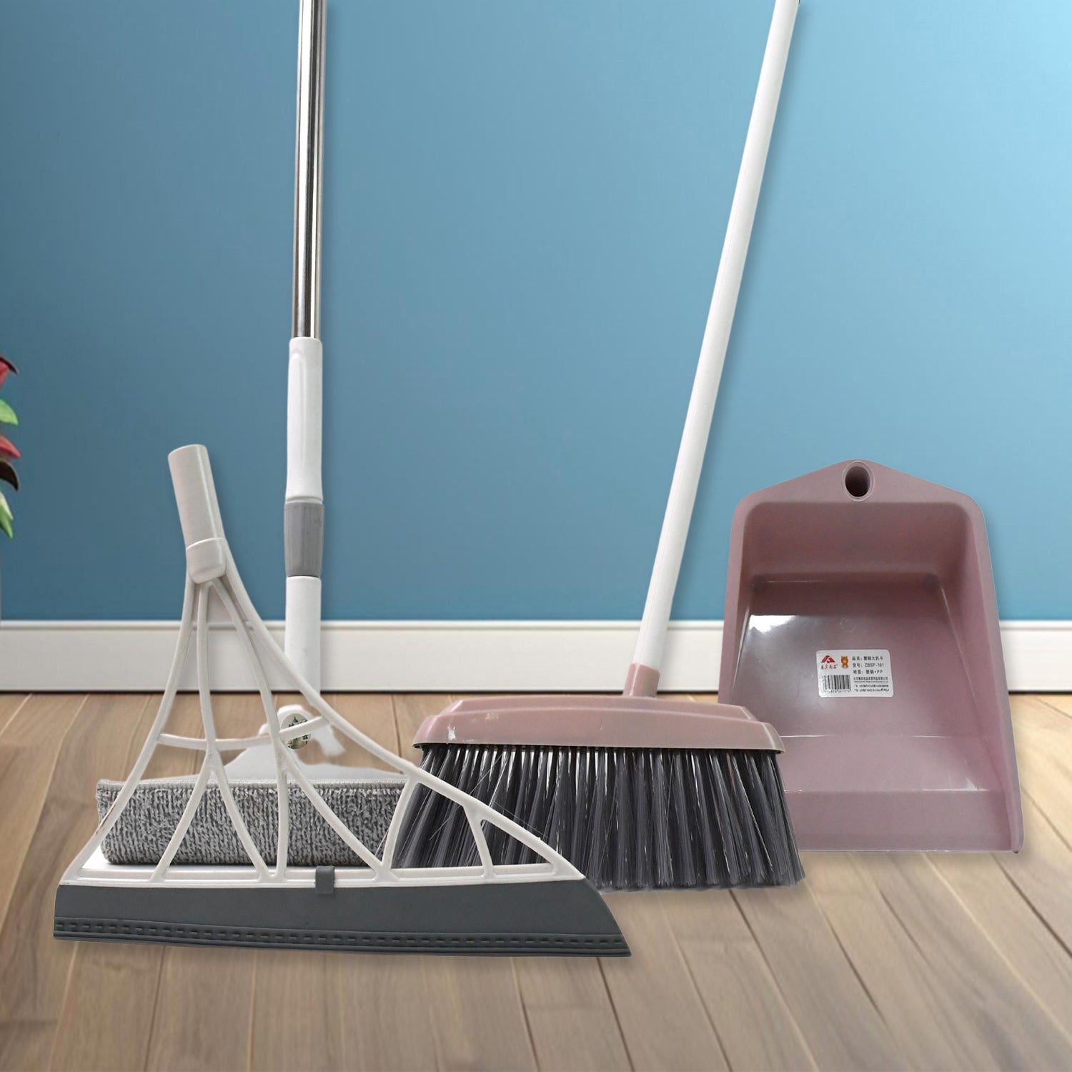4-piece cleaning tool set including broom, dustpan, and floor squeegee for efficient home cleaning