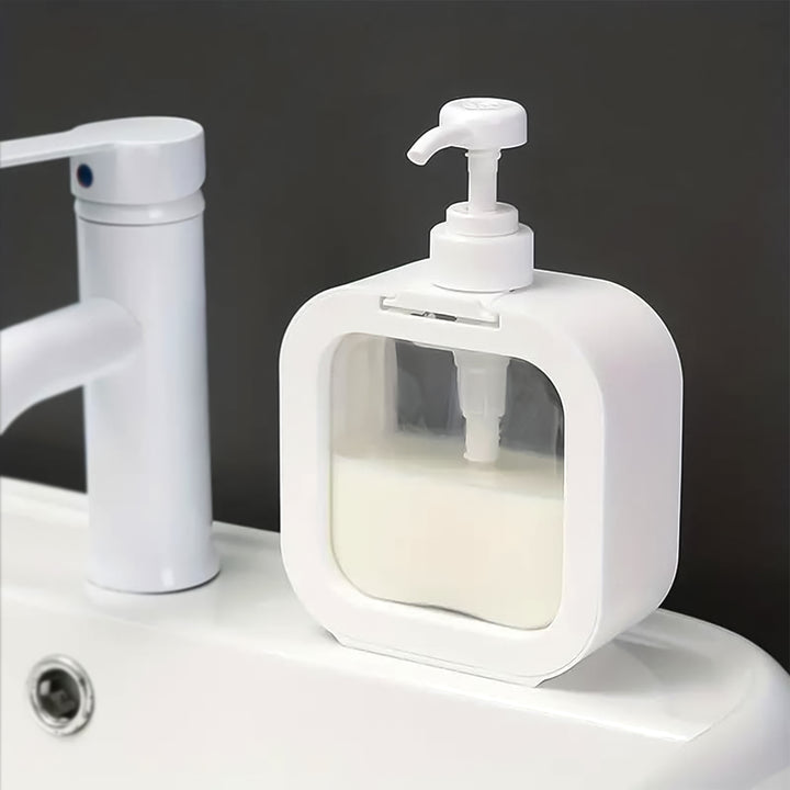 Clear pump lotion bottle 1 pc on a bathroom counter beside a faucet for easy dispensing