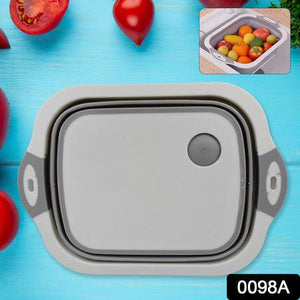 Collapsible cutting board with dish tub in gray, perfect for chopping and washing vegetables easily