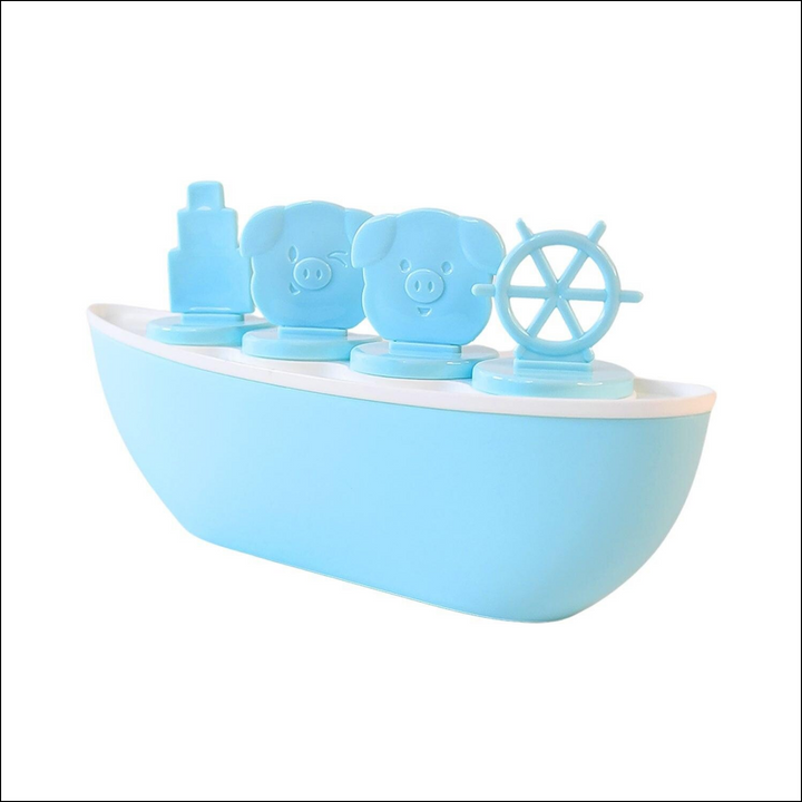 Boat shaped ice cream mold in blue with fun animal designs for making creative ice pops