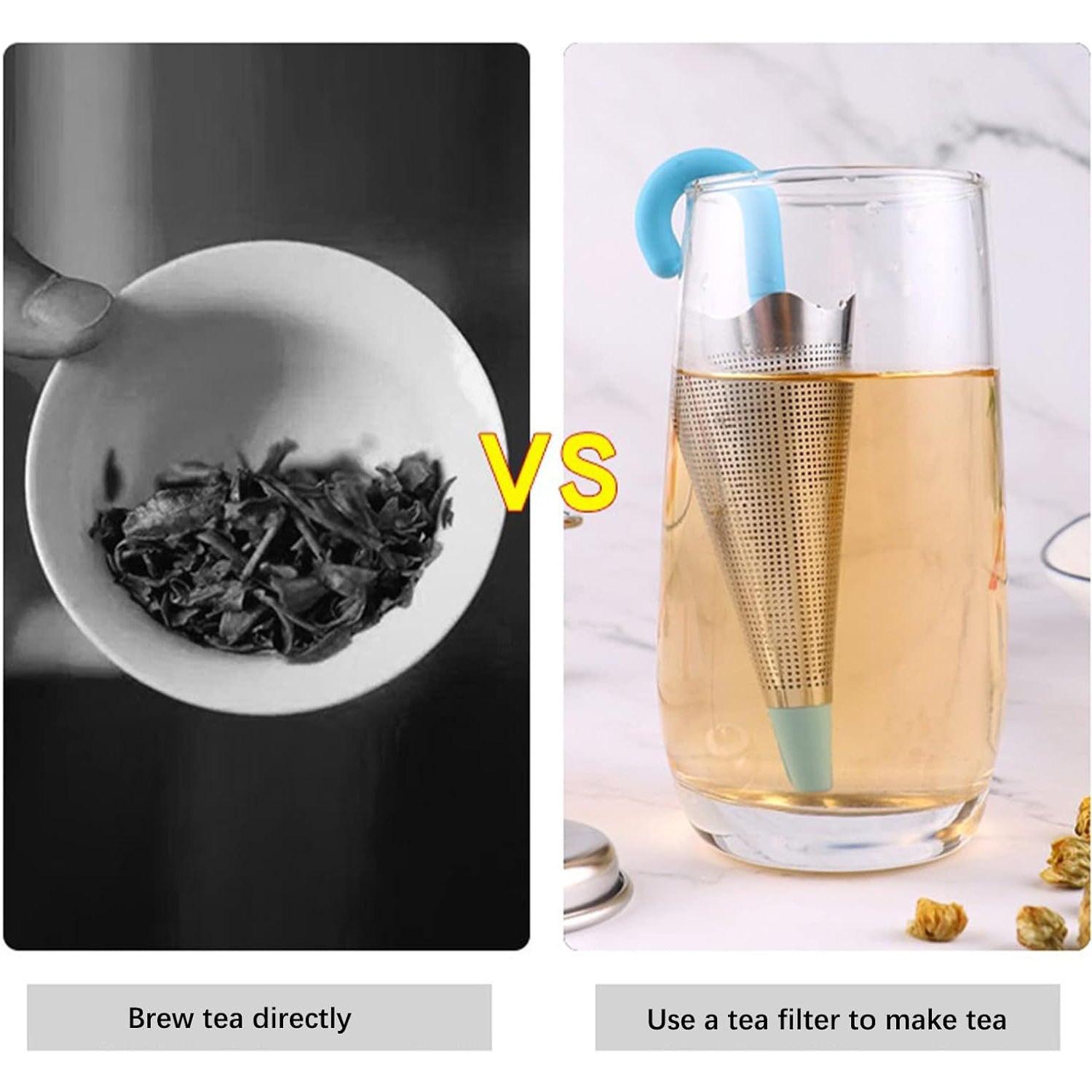 Cute umbrella tea strainer with a blue handle used to brew tea in a glass cup