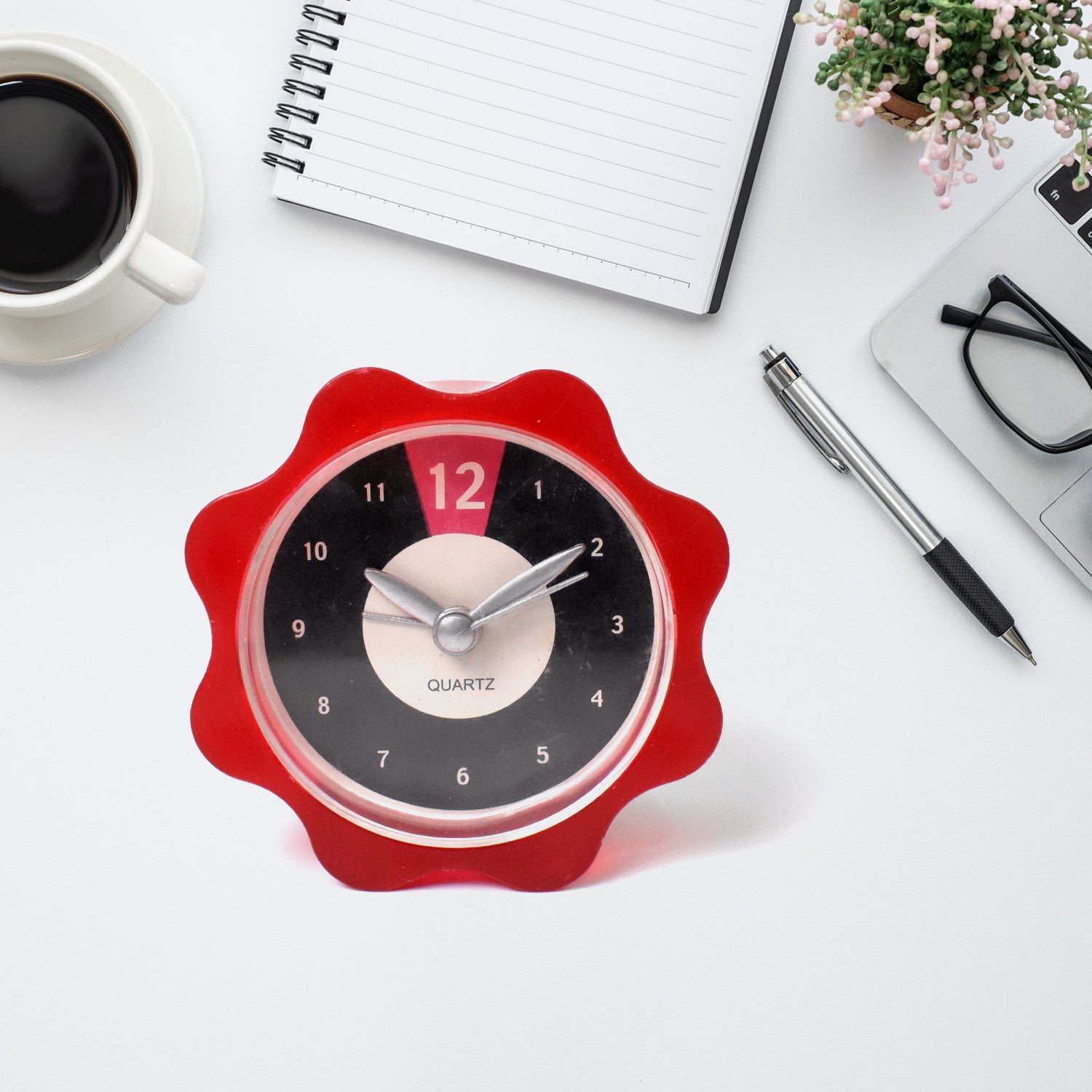 Bright red decorative clock with a flower design for every room in your home