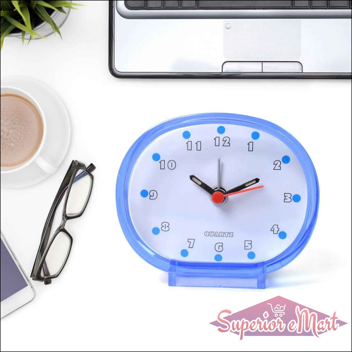 Blue decorative clock on desk with coffee and glasses, ideal decorative clocks for every room