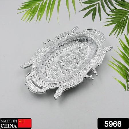Elegant silver decorative mukhwas serving tray with intricate designs and handles for serving snacks