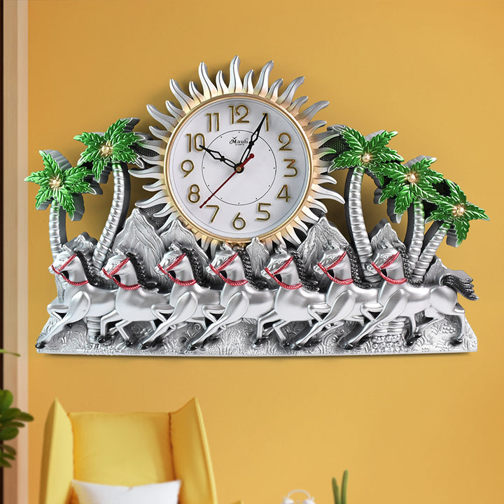Elegant decorative wall clock featuring horses and palm trees in a vibrant design