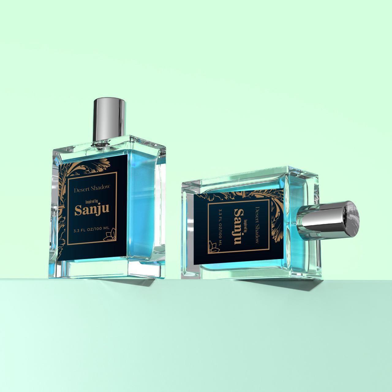 Desert Shadows Inspired by Sanju perfume in stylish glass bottles showcasing vibrant blue fragrance