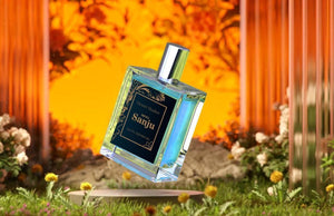Inspired by Sanju perfume in a stylish bottle with vibrant garden backdrop