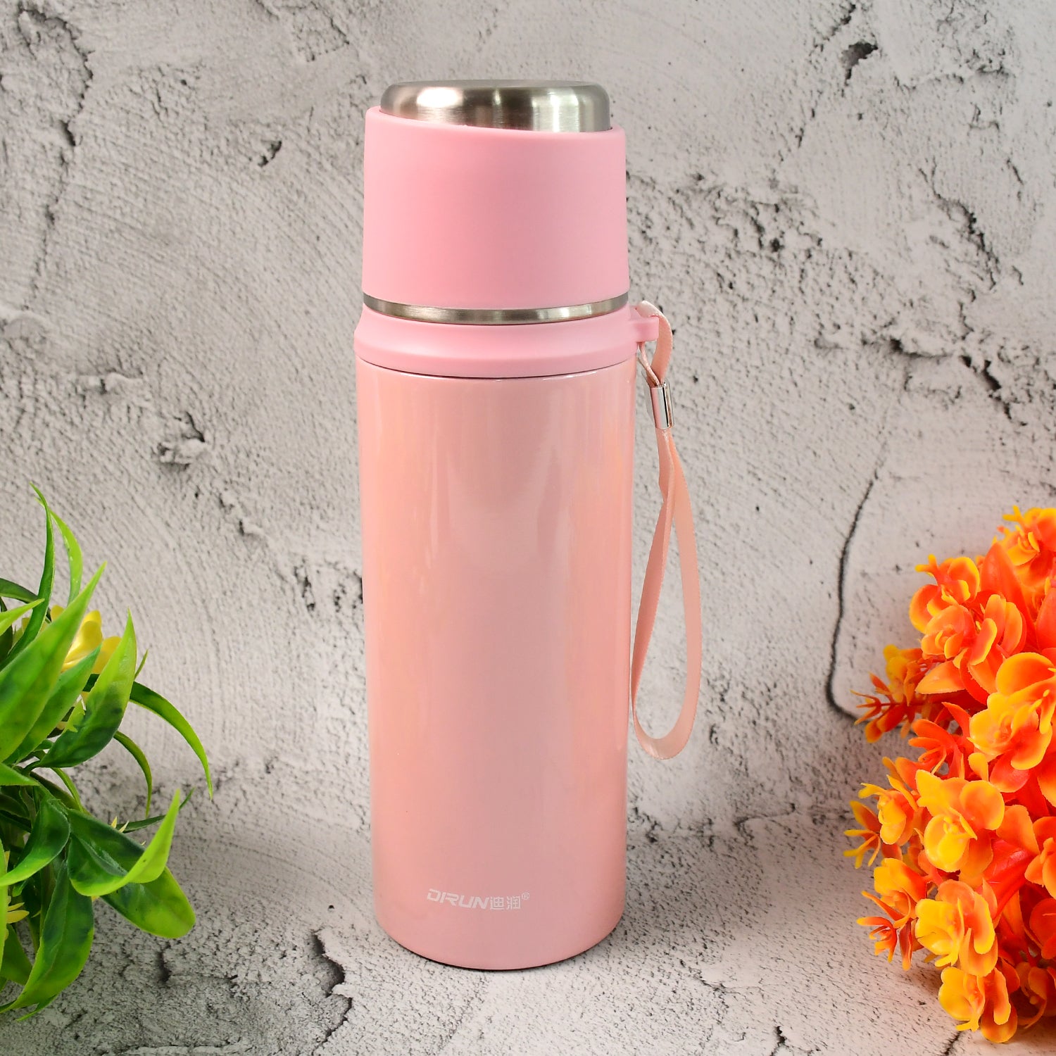 Pink 600ml insulated water bottle with wrist strap for home and kitchen use