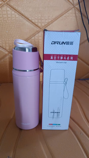 Superior eMart 600ml insulated water bottle in pink with carrying strap beside its white and red packaging box