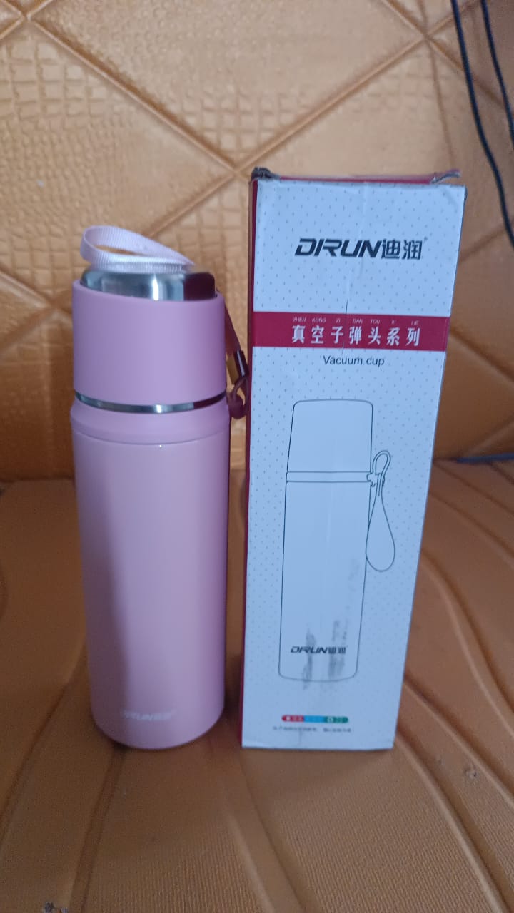 Superior eMart 600ml insulated water bottle in pink with carrying strap beside its white and red packaging box
