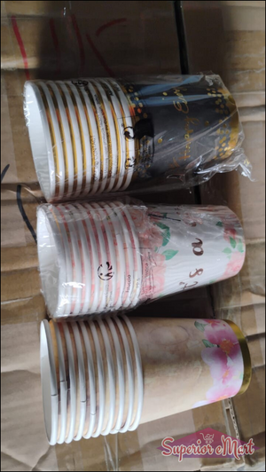 Disposable paper cups set in various designs stacked for parties and gatherings