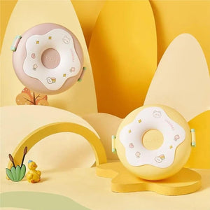 Colorful donut shaped lunch box with cute designs for kids, perfect for school or picnics