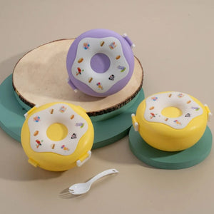 Colorful donut shaped lunch box set in purple, yellow, and white with cute designs for kids