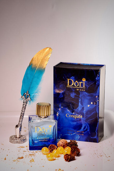 Dori Conquer Men Parfume in Blue Bottle with Decorative Elements and Feather for a Luxurious Touch