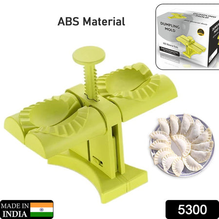 Green double head dumpling maker made of ABS material for easy dumpling preparation