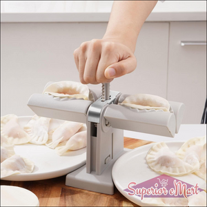 Double head dumpling maker in use, easily sealing dumplings for perfect homemade meals