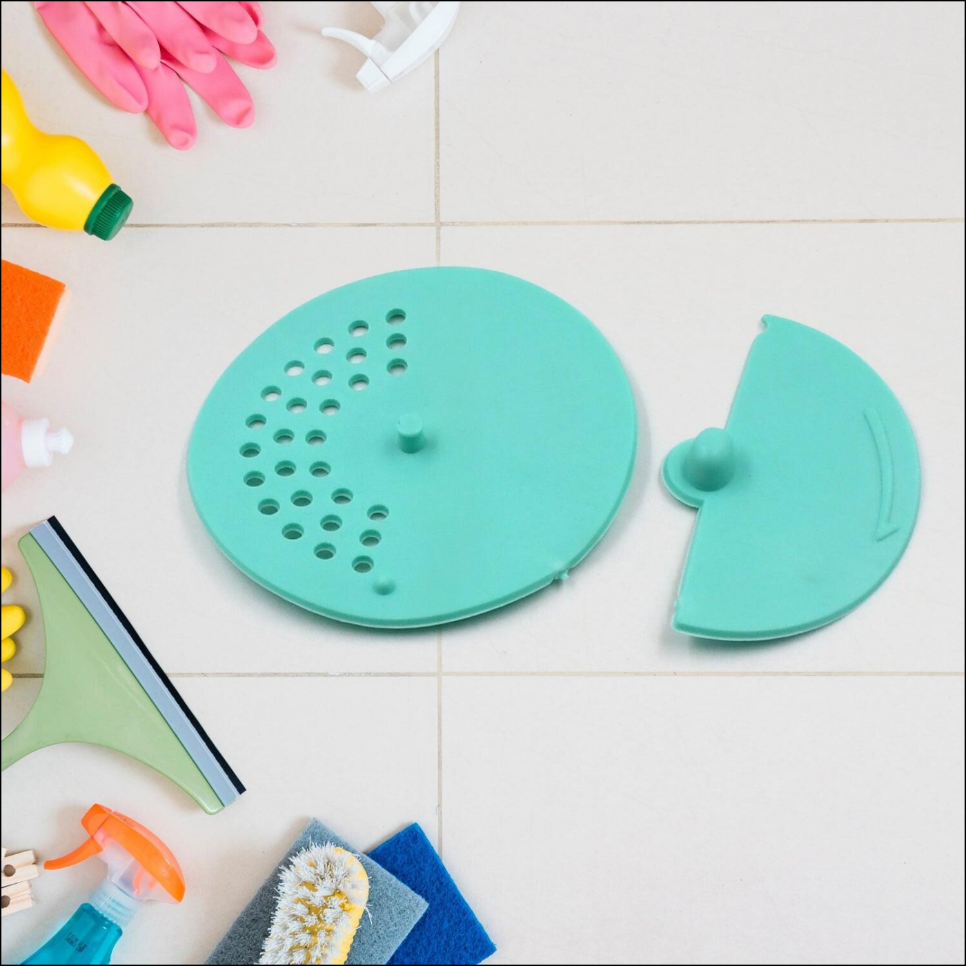 Superior eMart anti-odor drain cover for bathroom in teal, designed to prevent odors and block debris