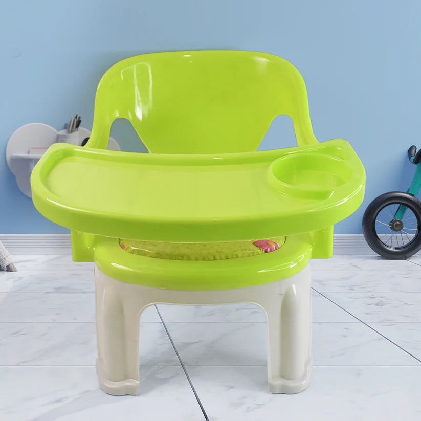 Bright green durable baby chair with tray for mealtime and playtime activities