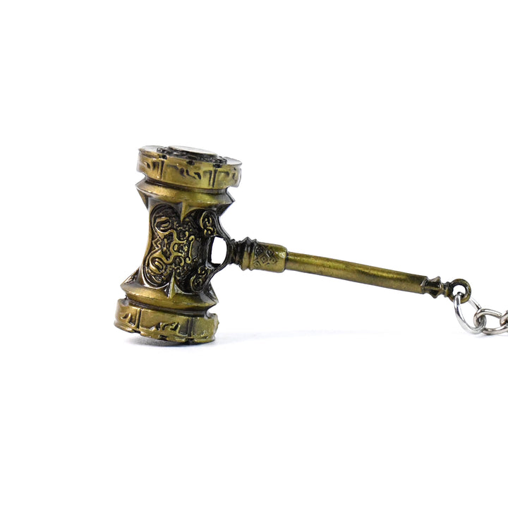 Durable metal keychain shaped like a gavel, perfect for legal enthusiasts and home decor