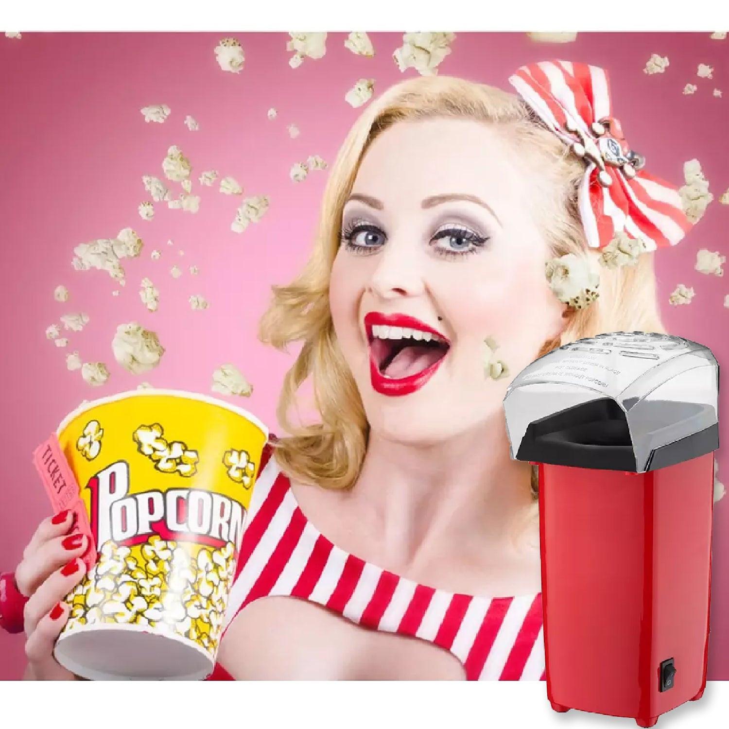 Electric popcorn maker machine in red with a retro design, perfect for movie nights at home