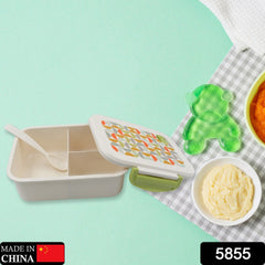 Three-compartment lunch box with spoon, ideal for school or office