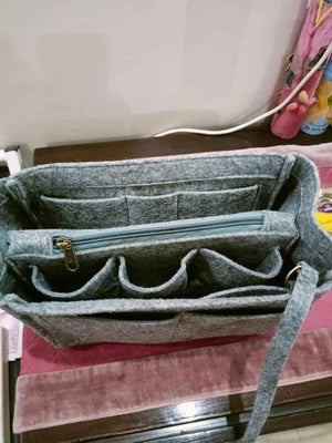 Gray felt purse organizer with multiple compartments for easy storage and organization