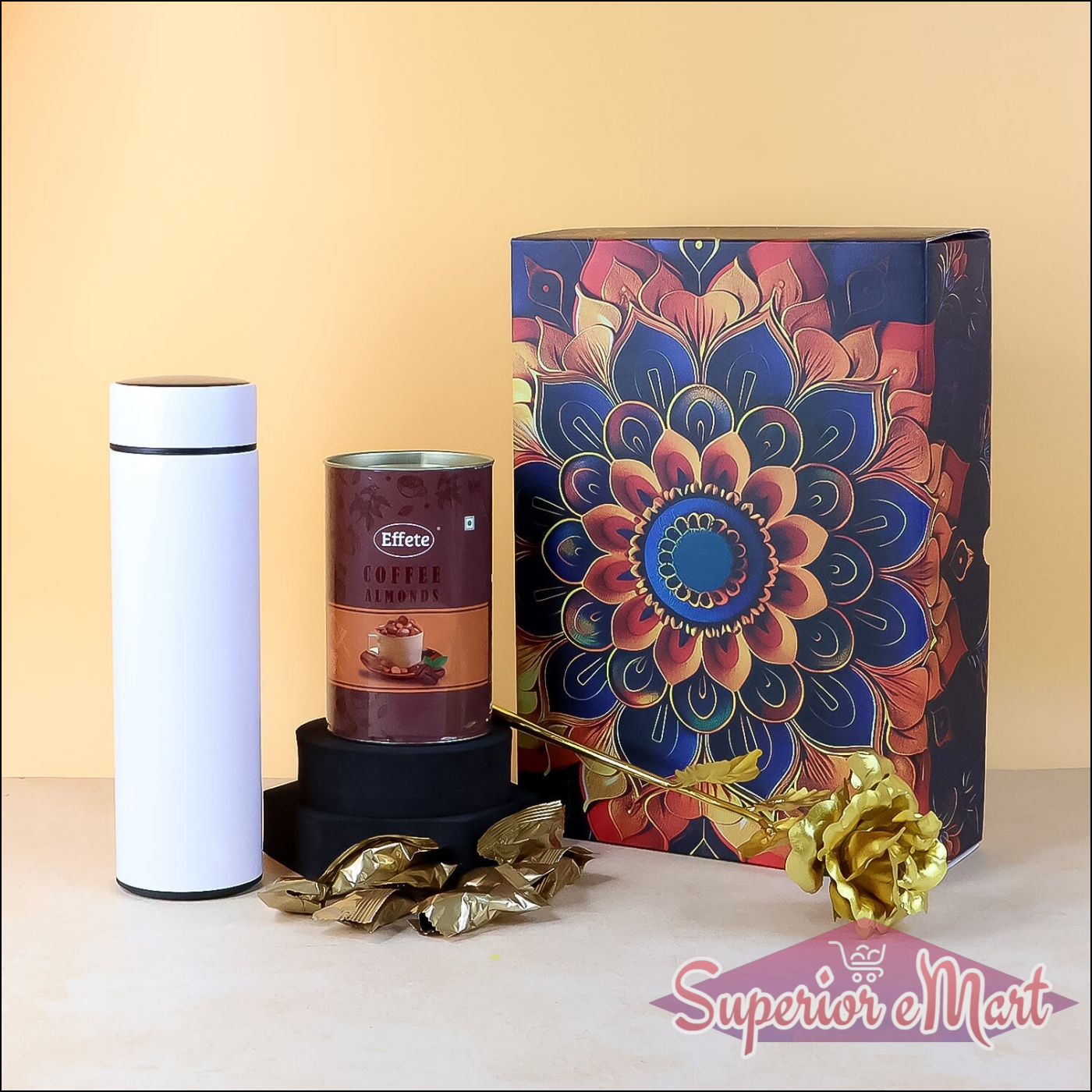 Festive gift hamper box with coffee blend, stylish canister, and decorative gold flower