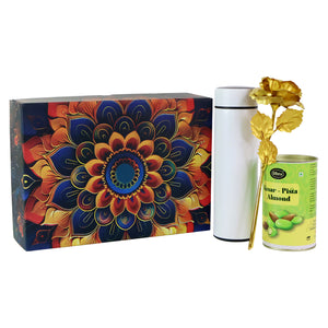 Colorful festive gift hamper box featuring a decorative design, a tea canister, and a tin of pistachio almonds