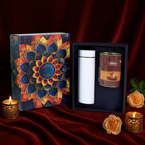 Festive gift hamper box featuring a colorful design with coffee and a stylish thermos inside