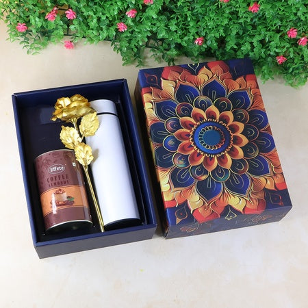 Colorful festive gift hamper box featuring a coffee jar and decorative items for special occasions