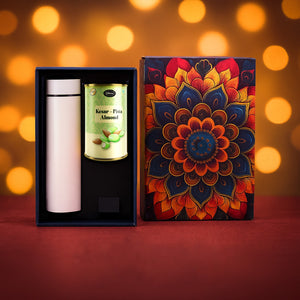 Festive gift hamper with stainless steel bottle and almond canister in decorative packaging