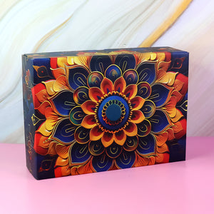 Festive gift hamper with stainless steel bottle featuring vibrant floral design and colorful packaging