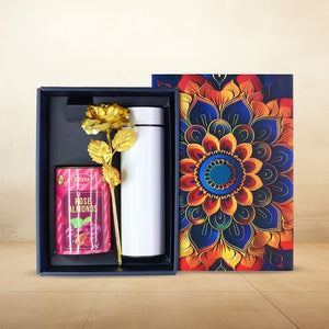 Festive gift hamper with stainless steel bottle and rose almonds in decorative box