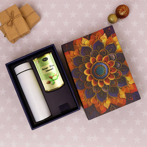 Festive gift hamper with stainless steel bottle and assorted almonds in decorative box